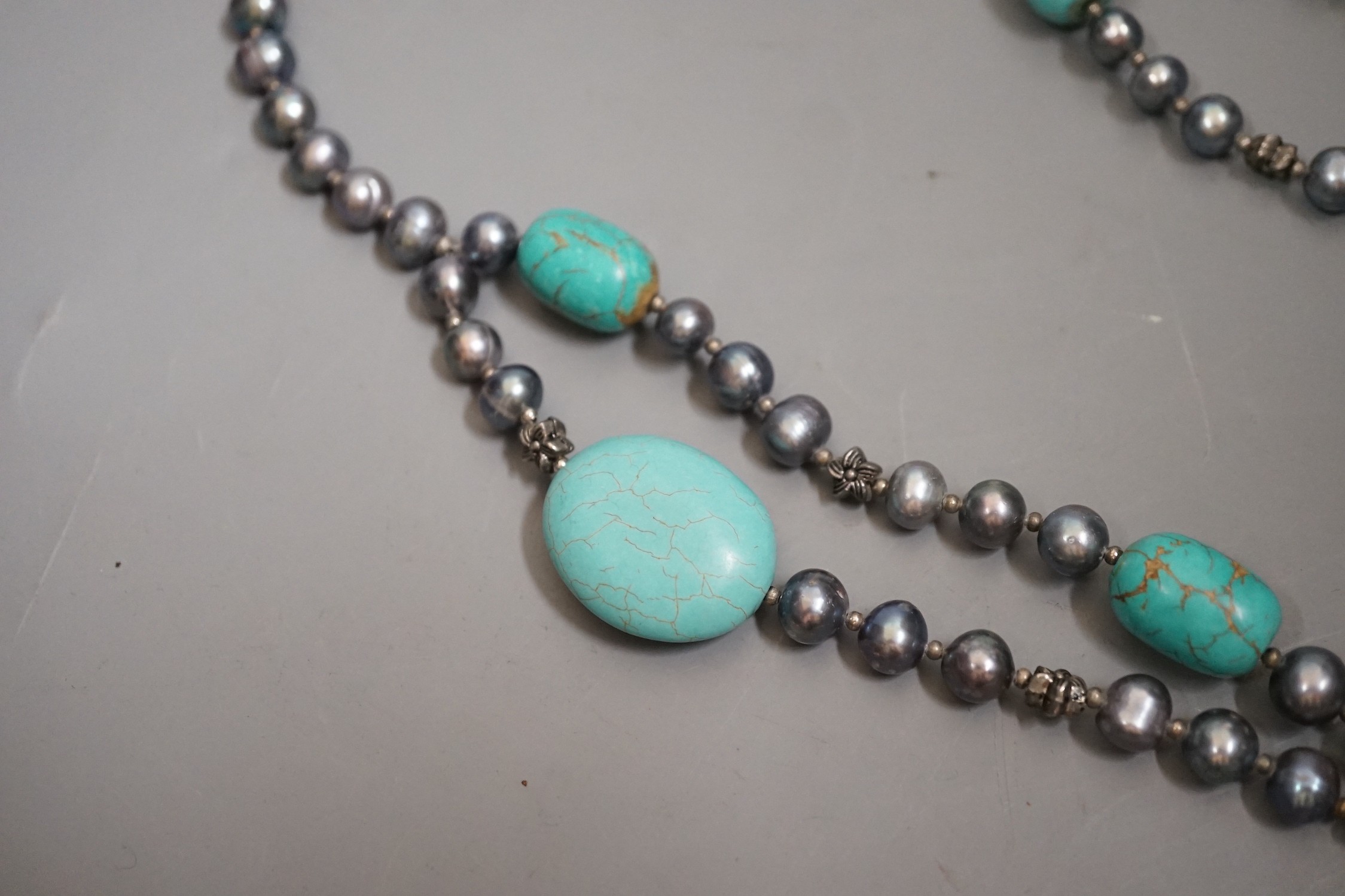 A single/double strand Tahitian? cultured pearl and turquoise necklace, 54cm.